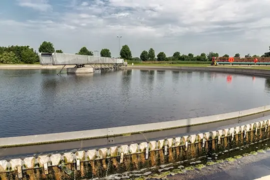 Waste water in secondary sedimentation tank of sewage treatment plant. This is the last step of the cleaning process with removing the last smaller particles.
